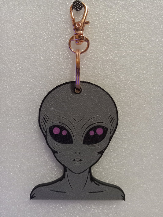 Galactic Grey/Pink Alien Keychain: A Cosmic Ambassador