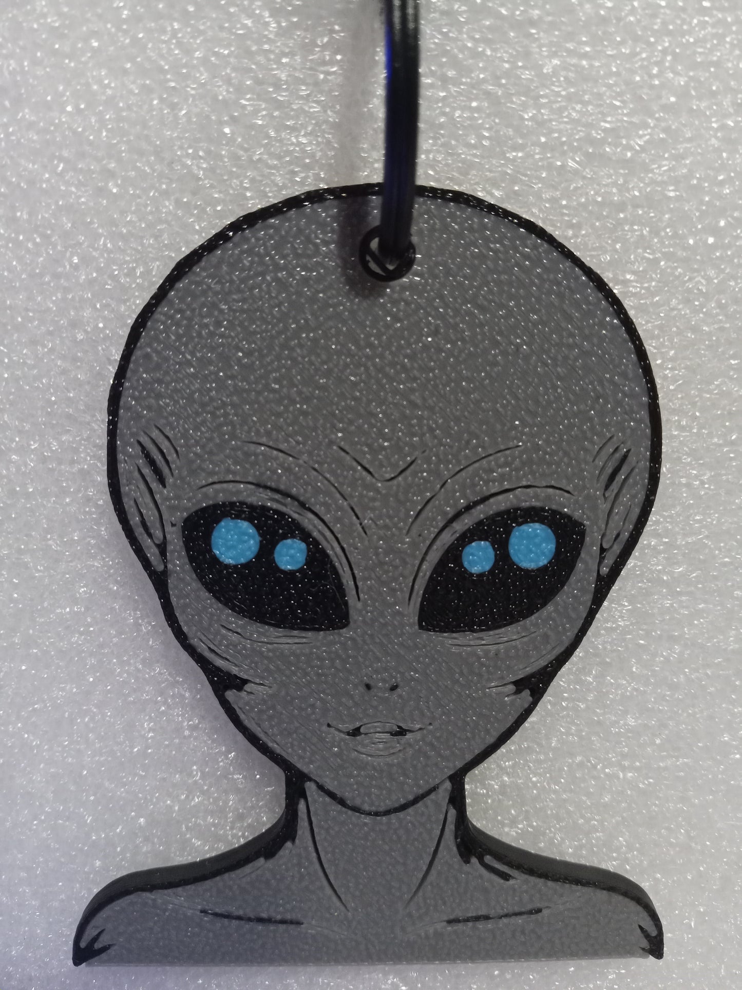 Galactic Grey/Blue Alien Keychain: A Cosmic Ambassador