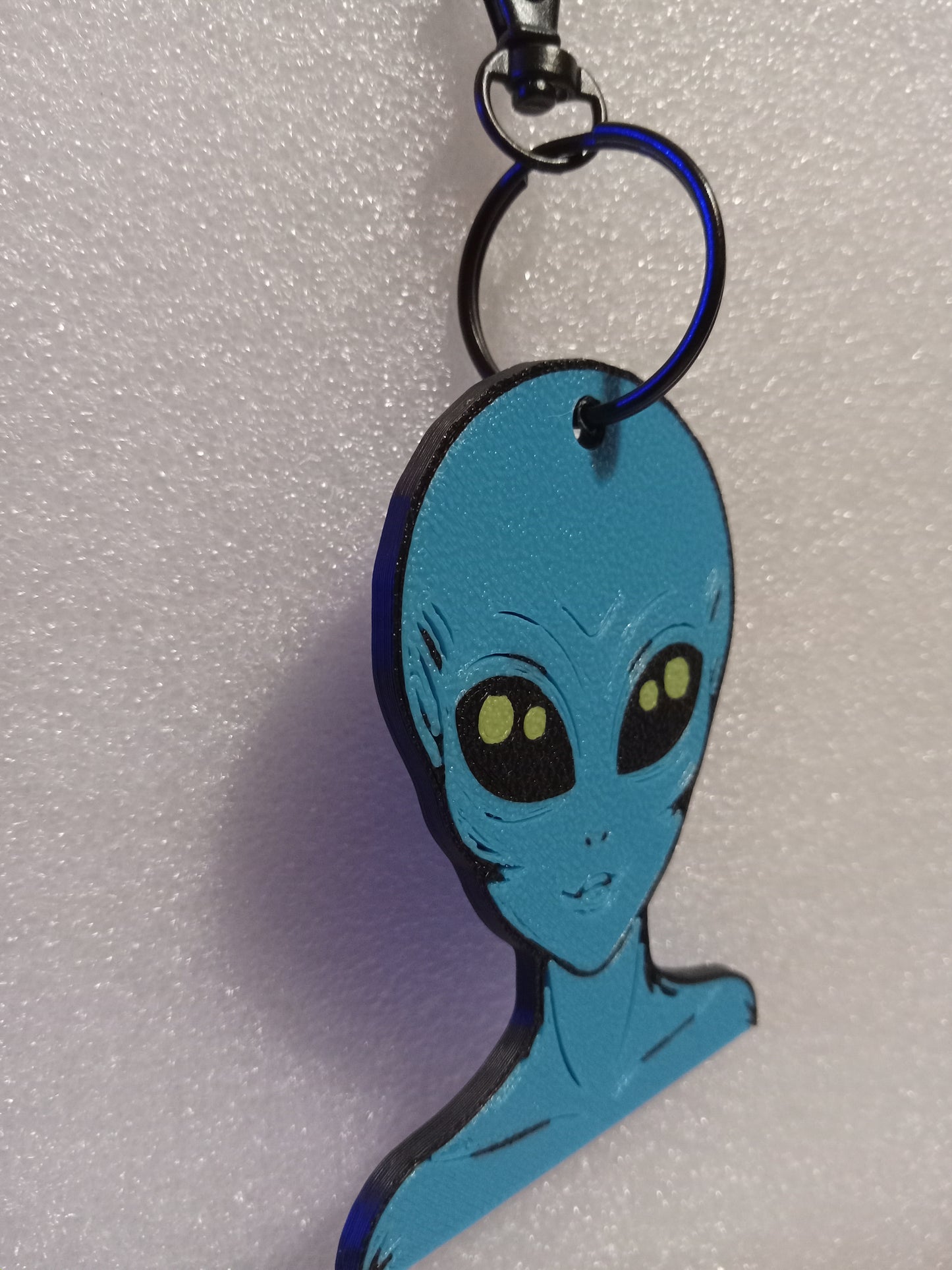 Galactic Blue Alien Keychain: A Cosmic Ambassador