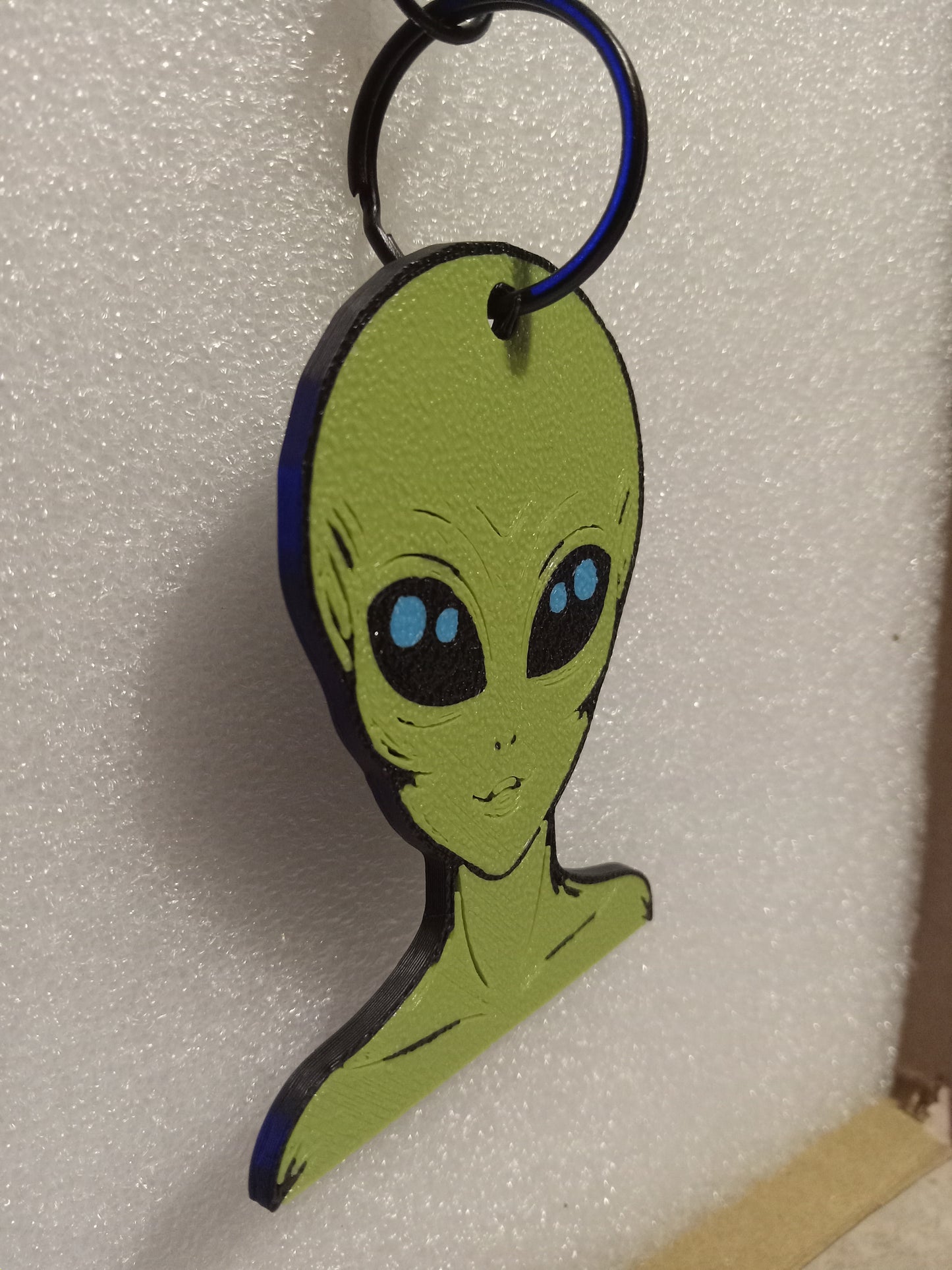 Galactic Green Alien Keychain: A Cosmic Ambassador